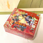 Carte da gioco Naruto TCG Kayou Chapter of the Ninja, scatola aperta con carte Rare BP NR CR, immagini di carte visibili.