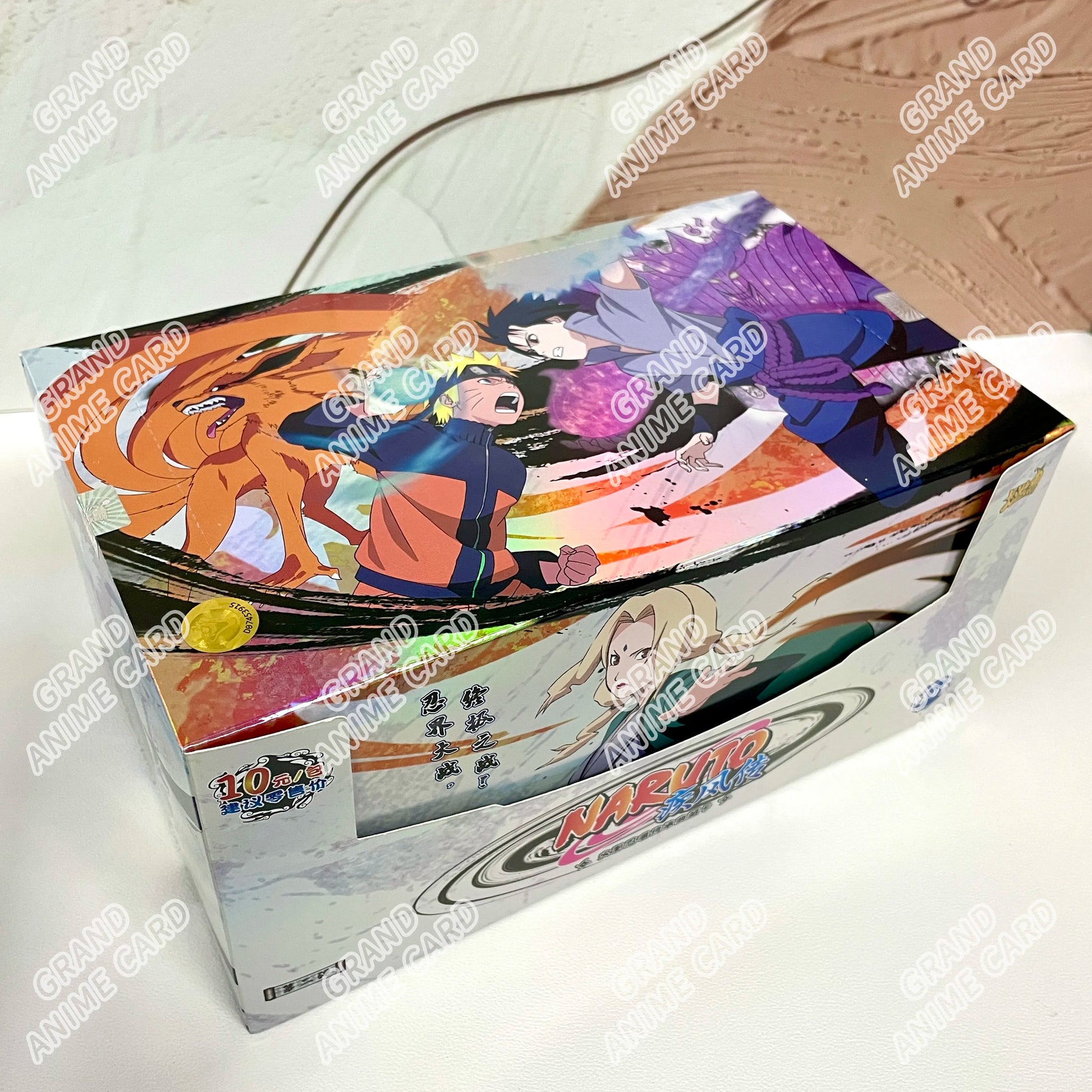 Scatola di carte Naruto KAYOU della collezione booster, con illustrazioni ufficiali Naruto e personaggi anime, vista frontale.