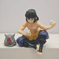 Figura d'azione Demon Slayer Anime con Tanjirou, Tomioka, Giyuu, Zenitsu e Nezuko, dettagliata e colorata.