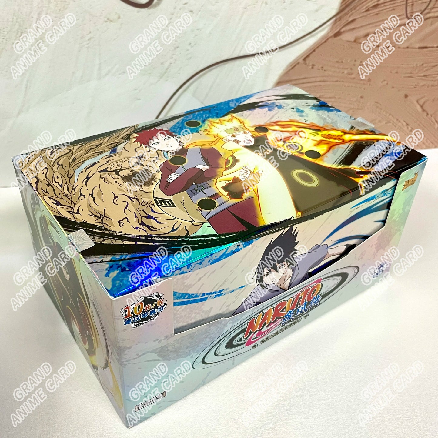 Scatola booster di carte Naruto della collezione KAYOU, con carte da gioco ufficiali Otaku Family Store Online.