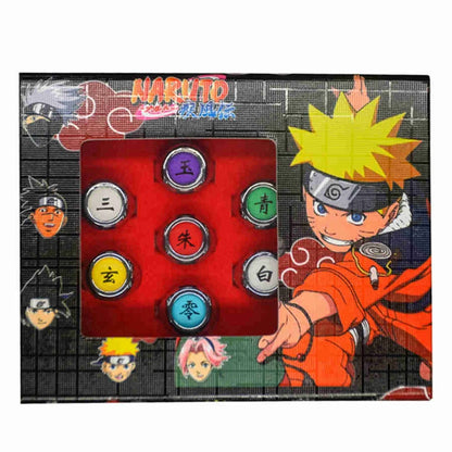 Anelli cosplay Akatsuki del clan più temuto di Naruto, con simboli rossi su sfondo nero, perfetti per costumi ninja.