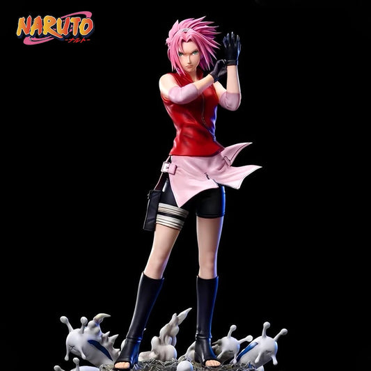Action figure di Sakura Haruno, forte kunoichi di Konoha, in posa dinamica, brand Otaku Family Store Online.