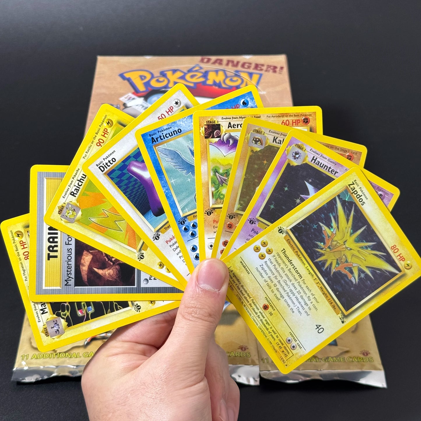 Booster di carte Pokémon Fossil Otaku Family Store con Aerodactyl, Lapras e Zapdos in scatola da collezione proxy