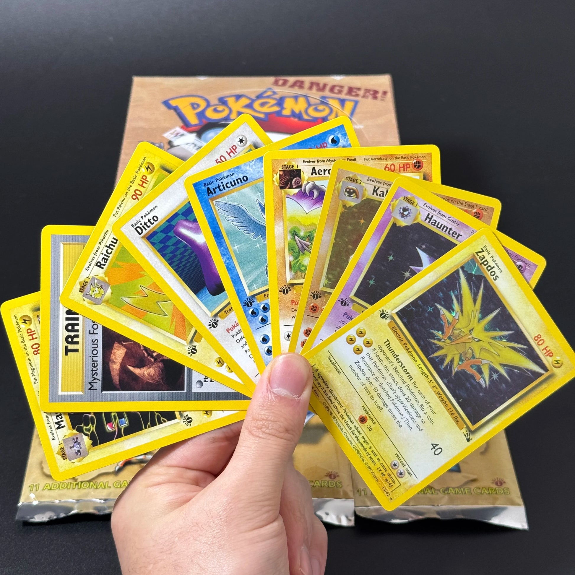 Booster di carte Pokémon Fossil Otaku Family Store con Aerodactyl, Lapras e Zapdos in scatola da collezione proxy