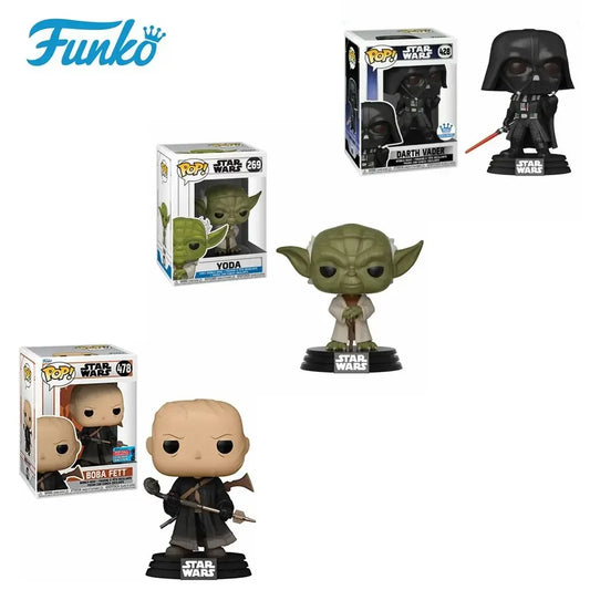 Funko Pop Star Wars: Boba Fett, Yoda e Darth Vader in formato figurina, dettagli colorati e stile caratteristico.