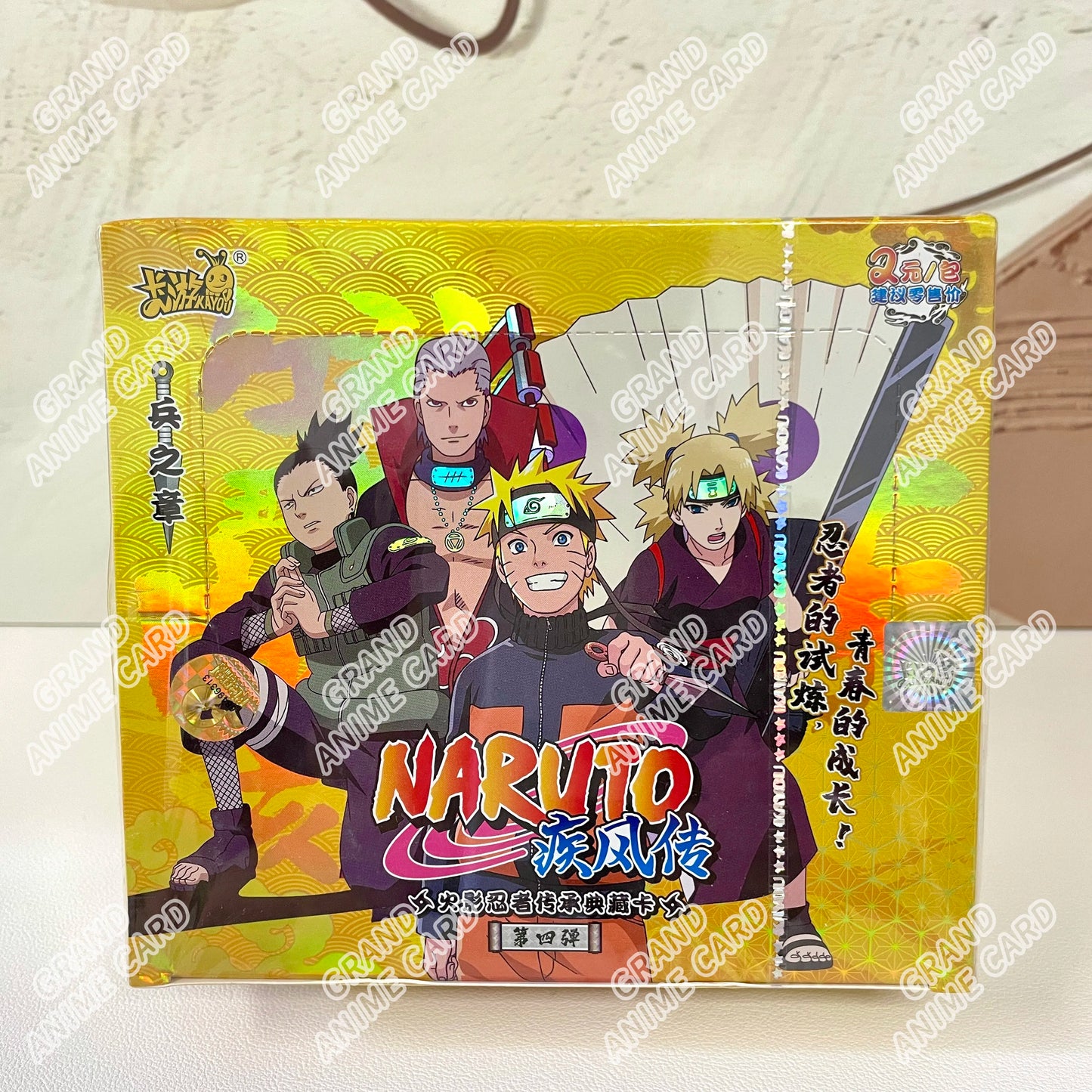 Scatola di carte Naruto KAYOU della collezione booster, con illustrazioni dei personaggi Naruto e altri, marca Otaku Family Store Online