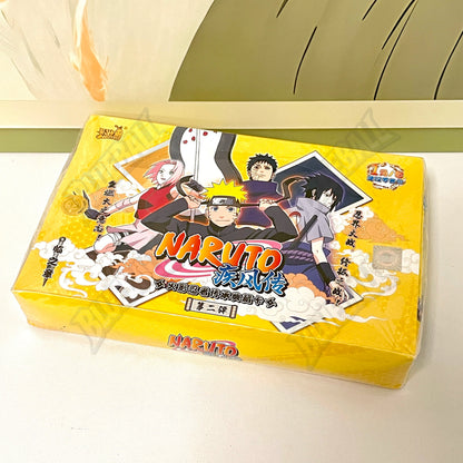 Carte da gioco Naruto TCG Chapter of the Ninja di Otaku Family Store, scatola aperta con carte rare e promo.