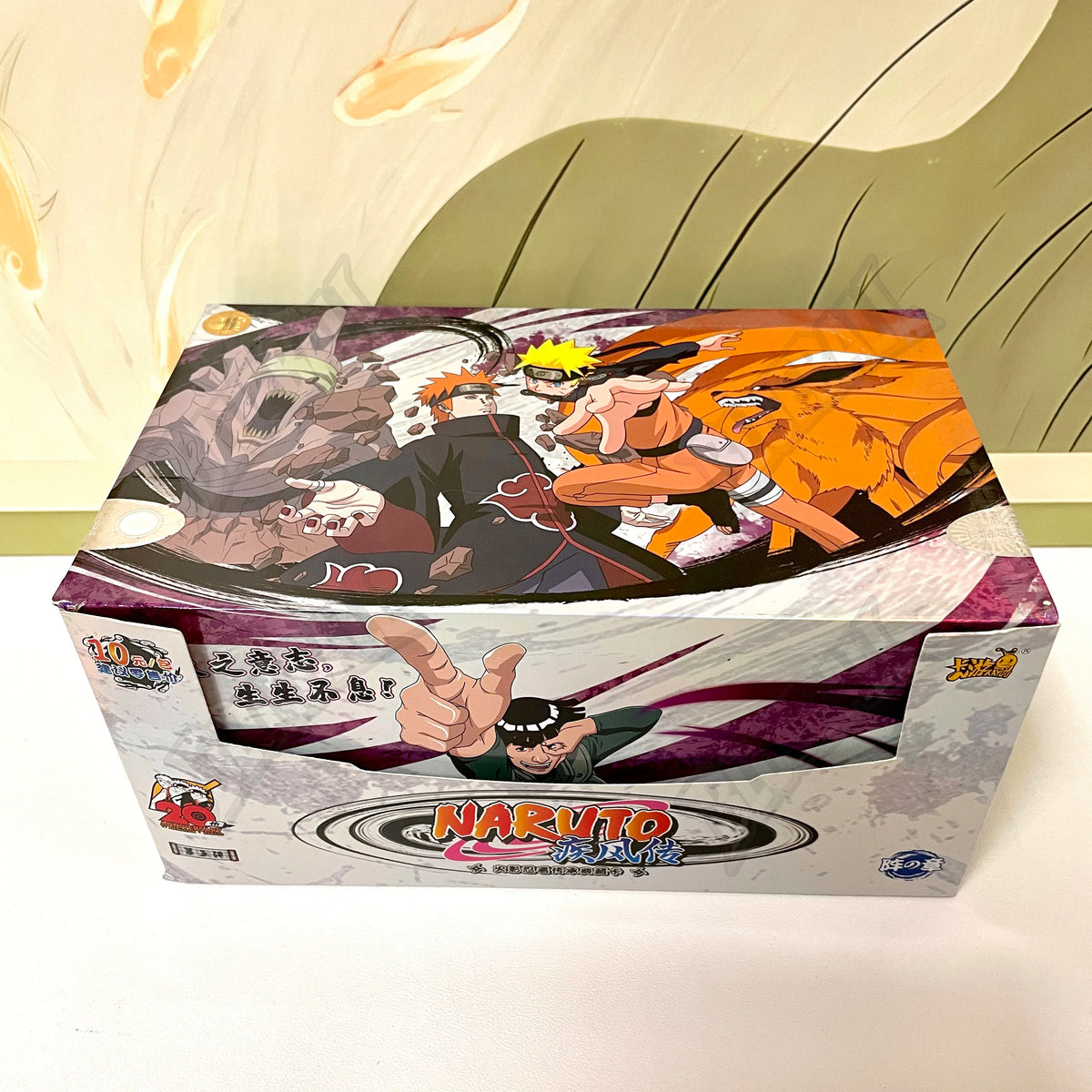 Set di carte Naruto TCG Kayou Chapter of the Ninja con carte rare aperte, mostrato in confezione con dettagli delle carte rare e BP NR CR