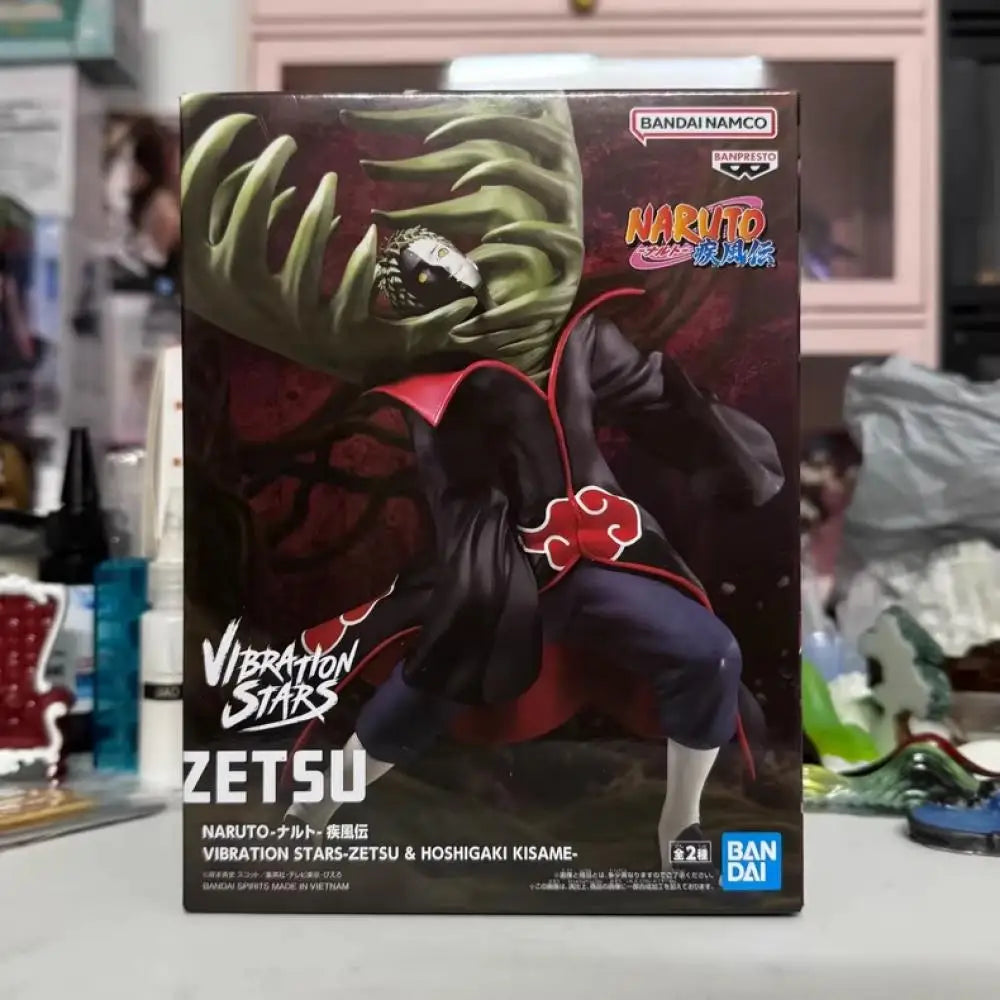 Figura d'azione dell'organizzazione Akatsuki di Naruto, marca Bandai Banpresto, con dettagli realistici e colori vivaci.