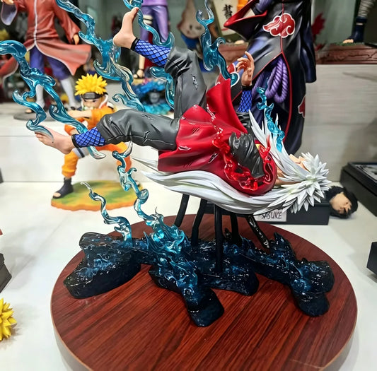 Figura d'azione Jiraiya di Naruto, alta 25cm, in posa con dettagli realistici e abbigliamento da ninja, marca Otaku Family Store.