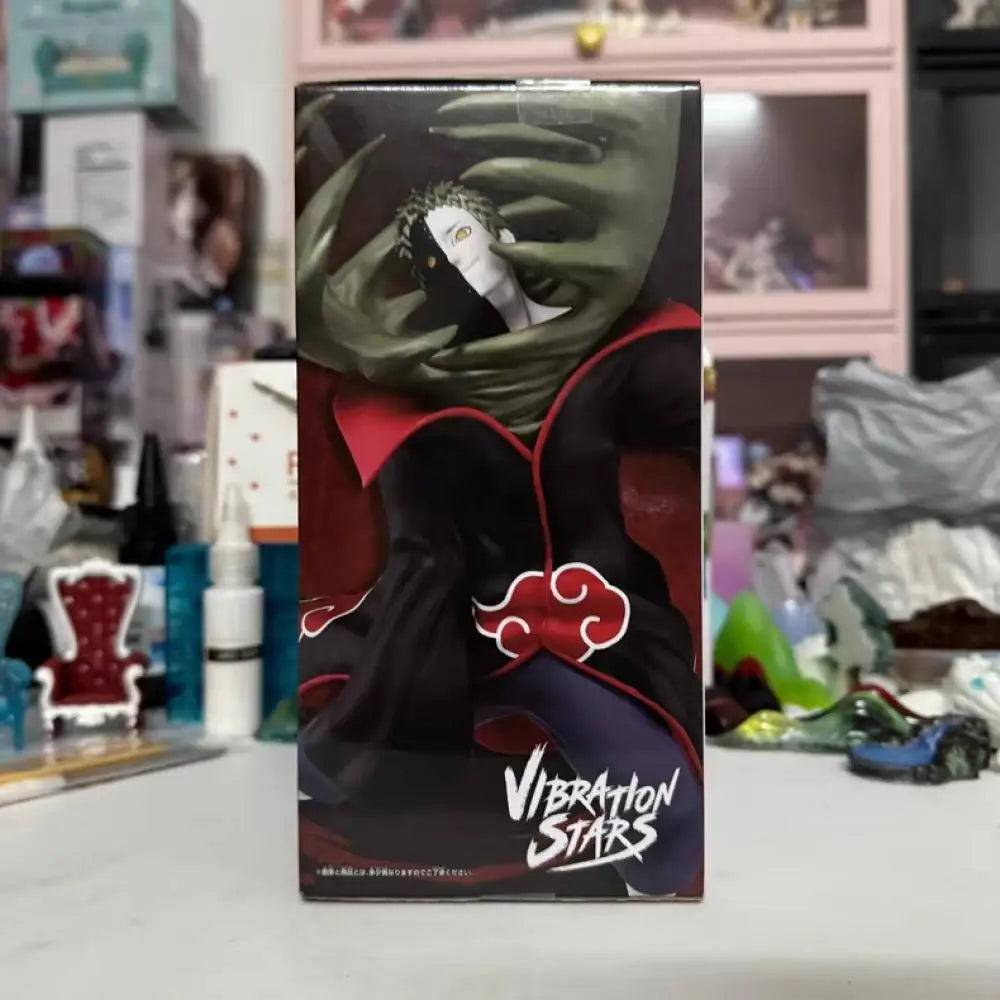 Figura d'azione dell'organizzazione Akatsuki del anime Naruto, marca Bandai Banpresto, dettaglio con personaggi e accessori.