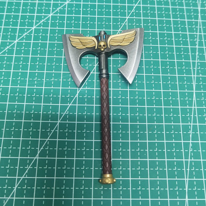 Figura d'azione Warhammer Ultramarines Metaurus con ascia, scudo e pistola al plasma, modello di alta qualità, dettagli realistici.