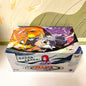 Carte da gioco Naruto TCG Chapter of the Ninja di Otaku Family Store, box aperta con carte rare e non rare visibili.