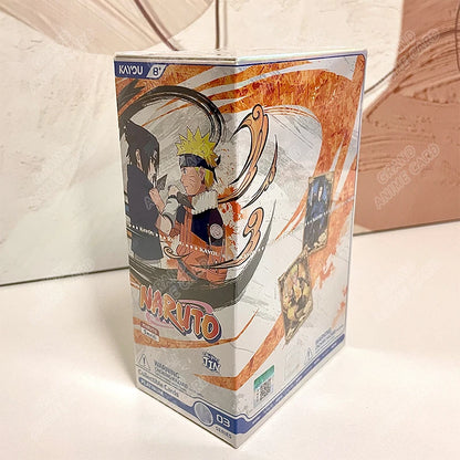 Scatola di carte da collezione Naruto KAYOU Booster Box, versione globale, con illustrazioni di personaggi Naruto e simboli ninja.