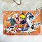Scatola booster di carte Naruto KAYOU della collezione ufficiale T2W9/T4W8, con immagini di personaggi Naruto e simboli della serie.